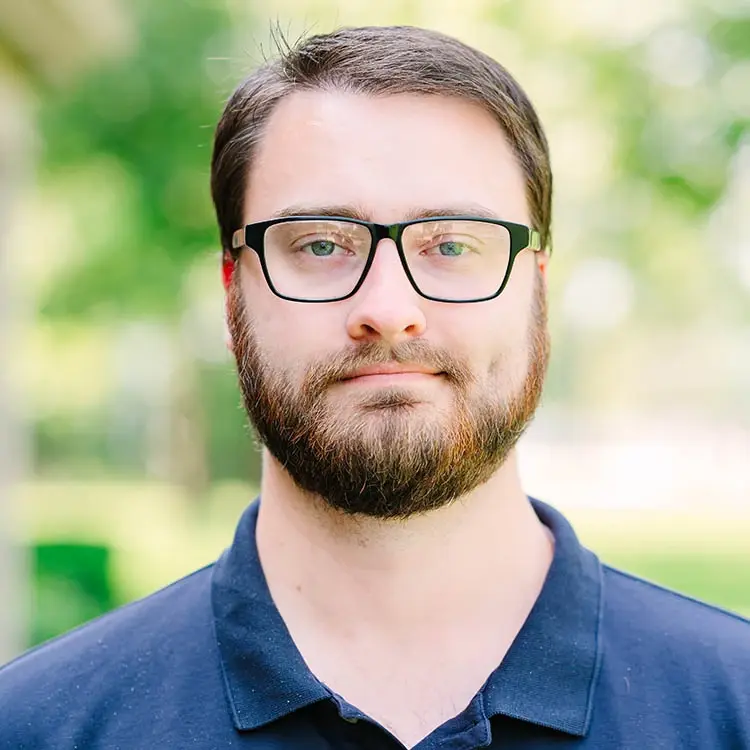 Nathan-Headshot-with-Glasses-051624